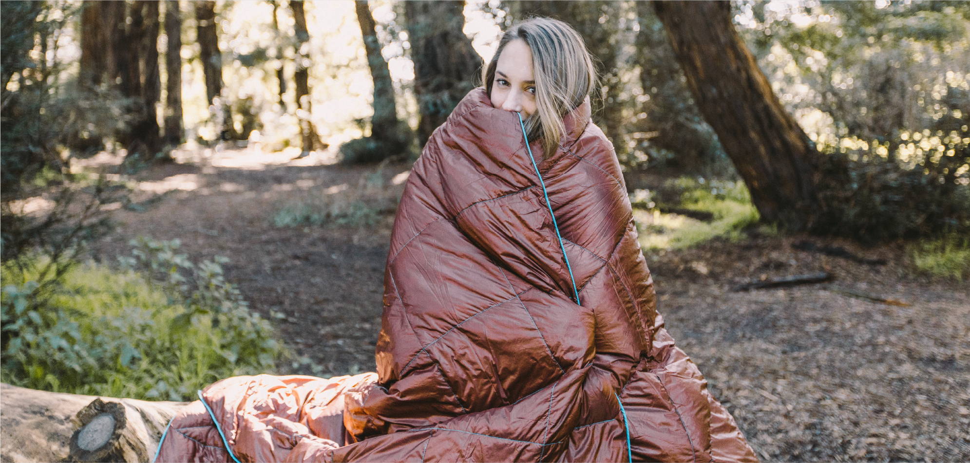Woman wrapped in outdoor blanket Rumpl at Golden Gate Park