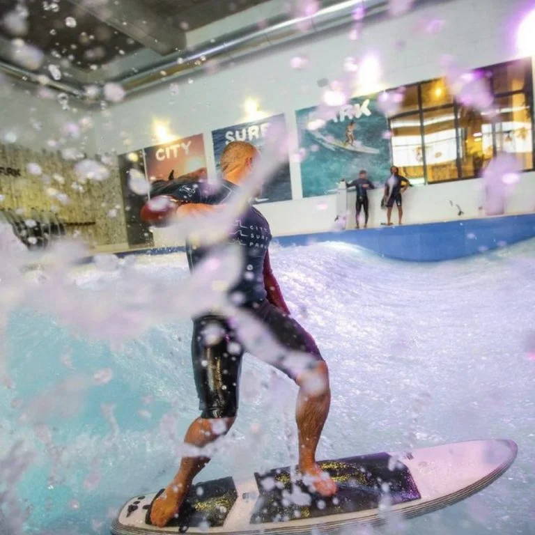 Person surfing KANOA Performance foamie Surfboard