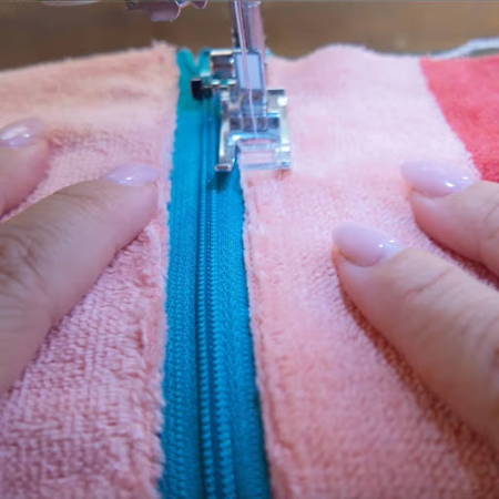 Topstitching on the second panel along the zipper, panel folded back flat