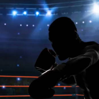 two boxers fighting in a boxing ring