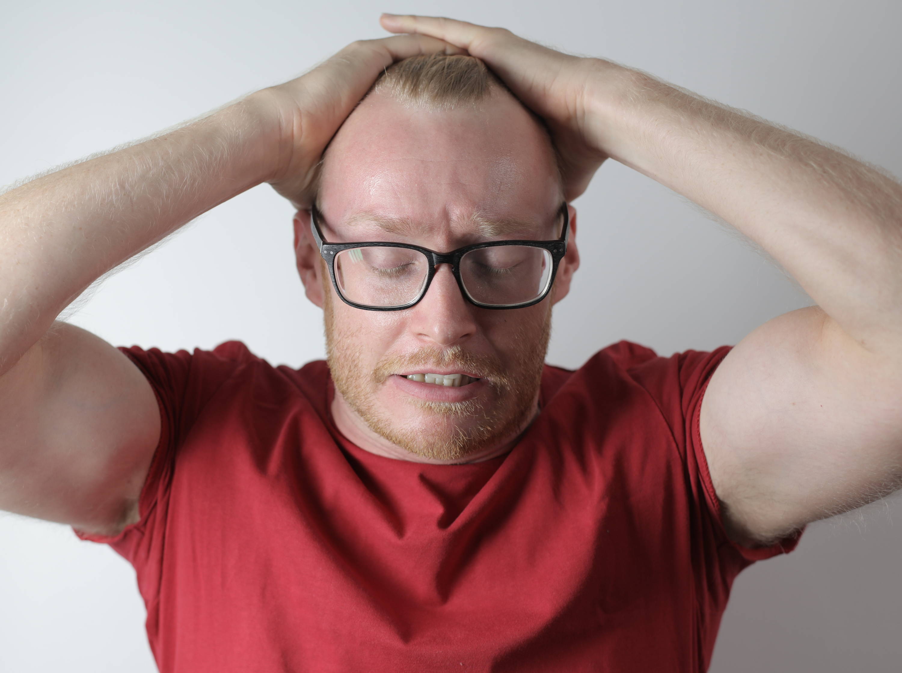 Man wearing glasses for migraines