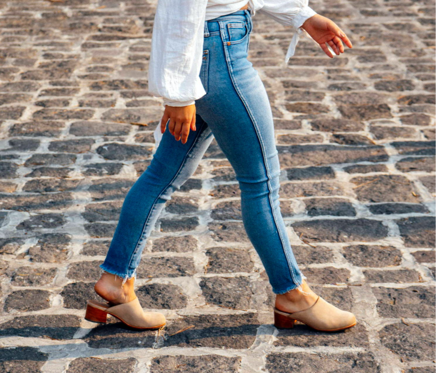 Woman walking with leather mules