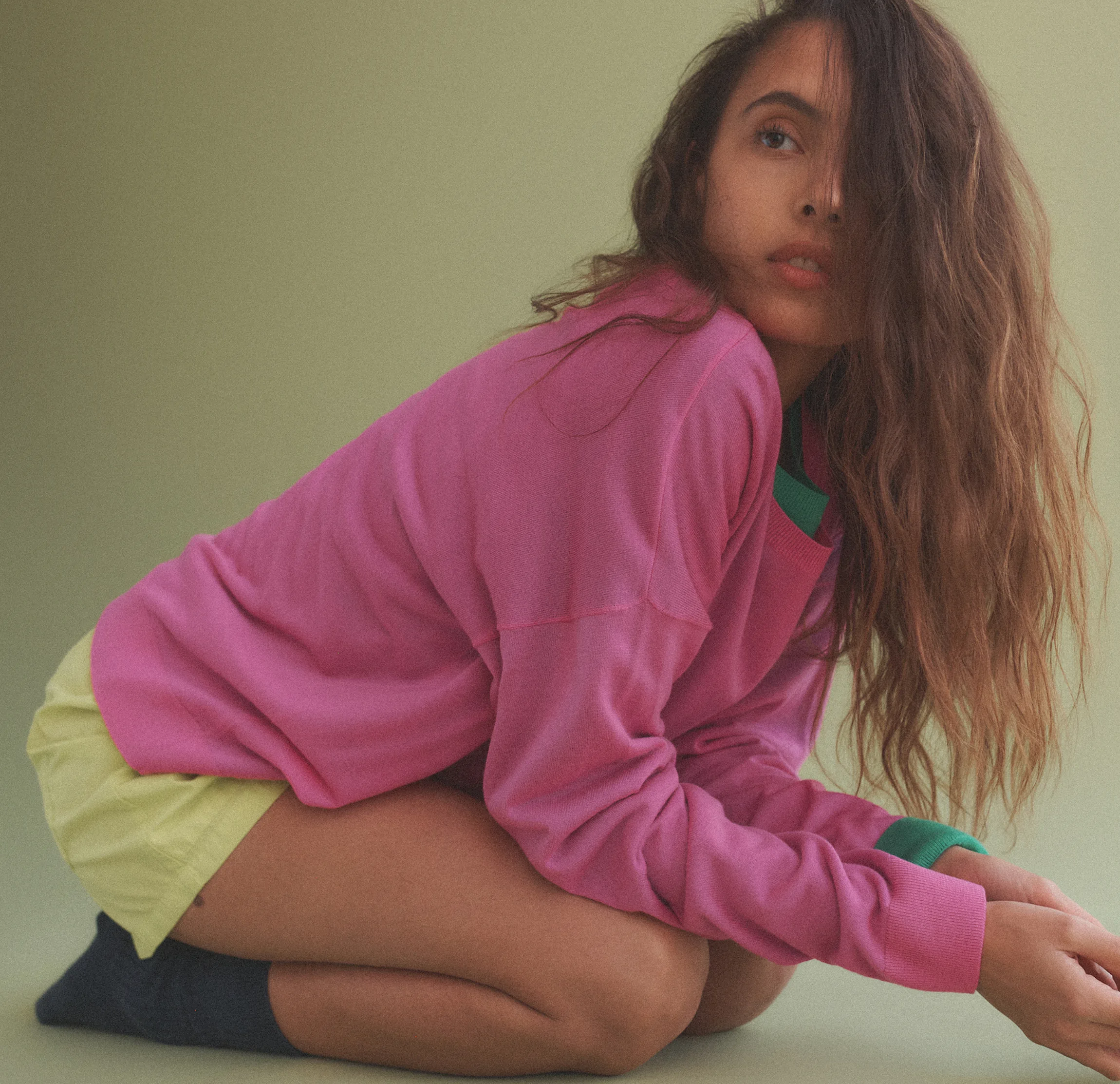 Woman sitting on feet