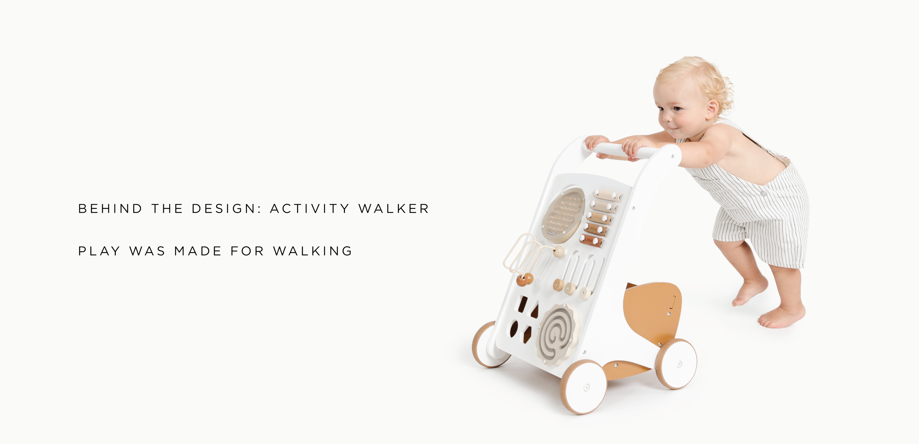Behind the design: activity walker. Play was made for walking. Toddler pushing Gathre Activity Walker. 