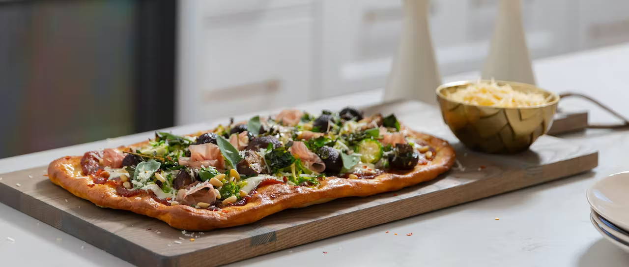 Brussels sprouts flatbread in white kitchen