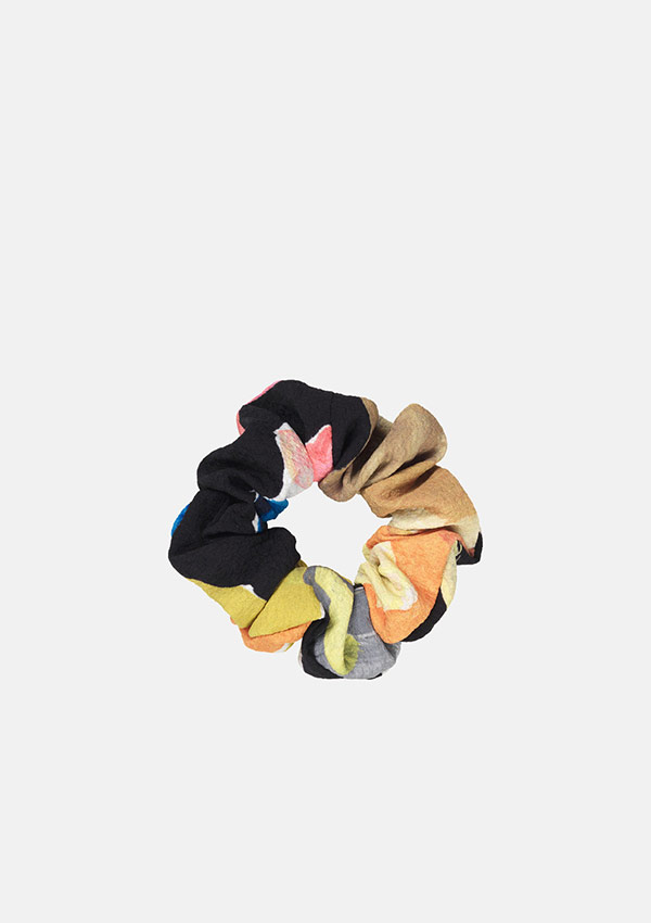 Product image of Stine Goya hair Scrunchie in Artistic Floral colourway full of orange, yellow, pink, brown and black.