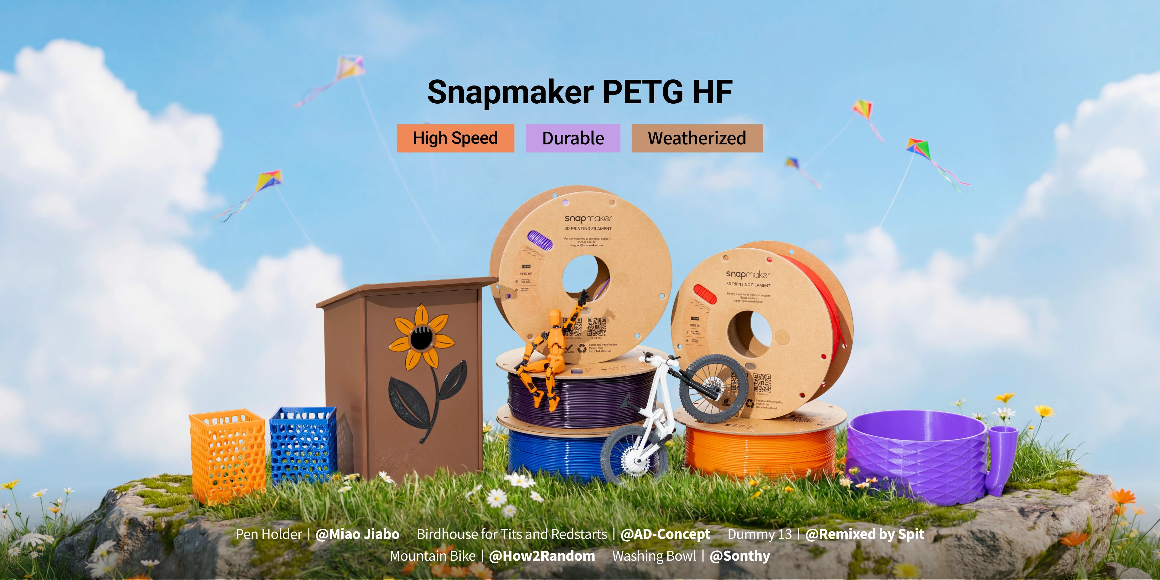 Colorful pet products displayed outdoors with a blue sky and green grass.