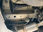 Black train horn trumpet mounted under Carrie's Acura MDX near rear exhaust and spare tire photo 3