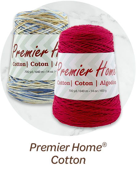 Two spools of Premier Home cotton yarn in red and multi.