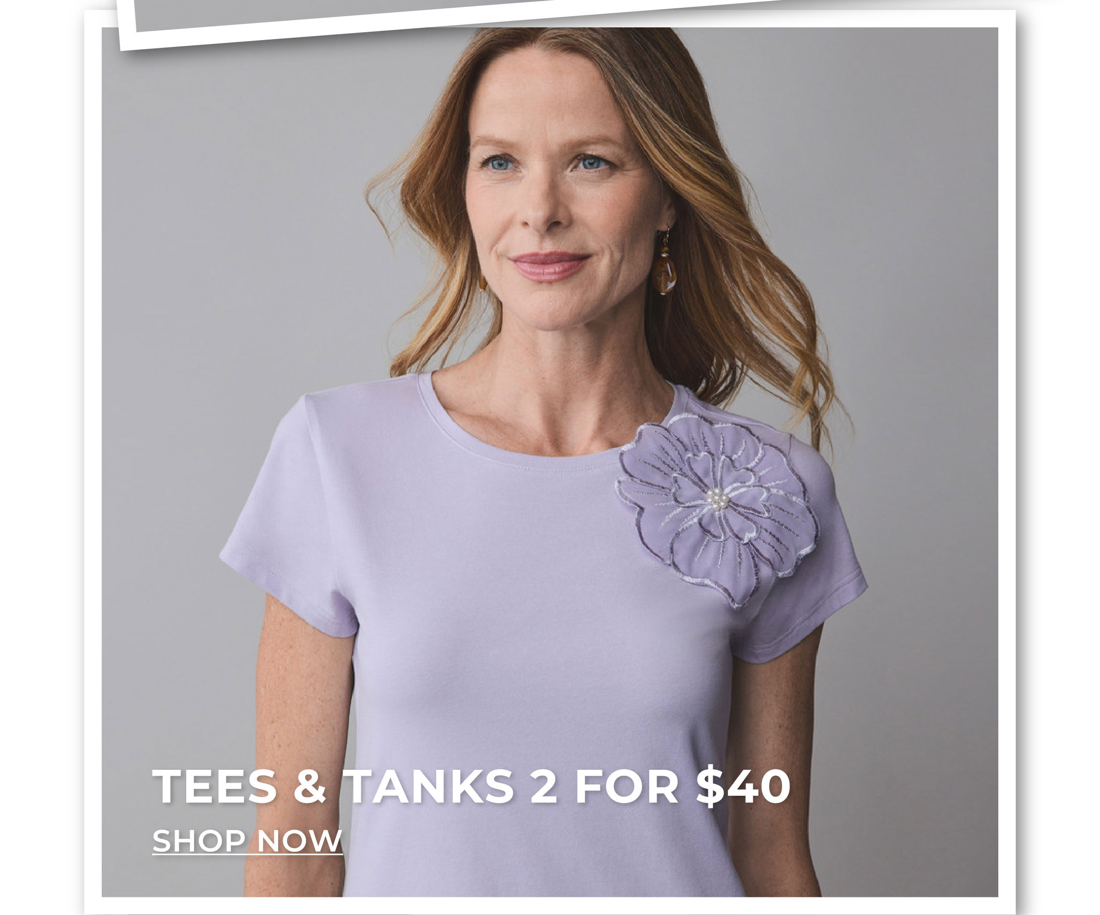 Woman in purple floral t-shirt. Tees and Tanks 2 for $40.
