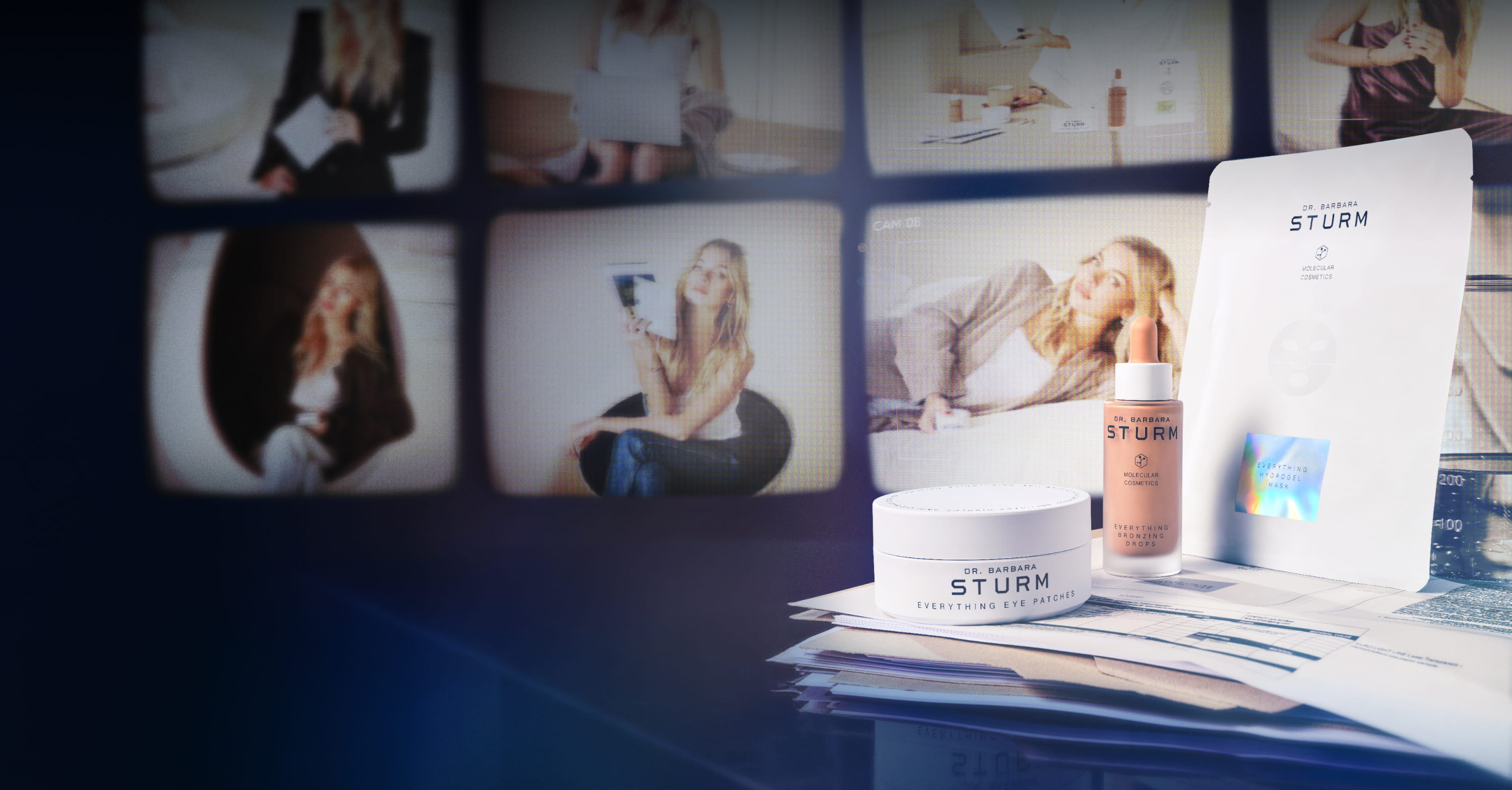 Skincare products and photos displayed on a table.