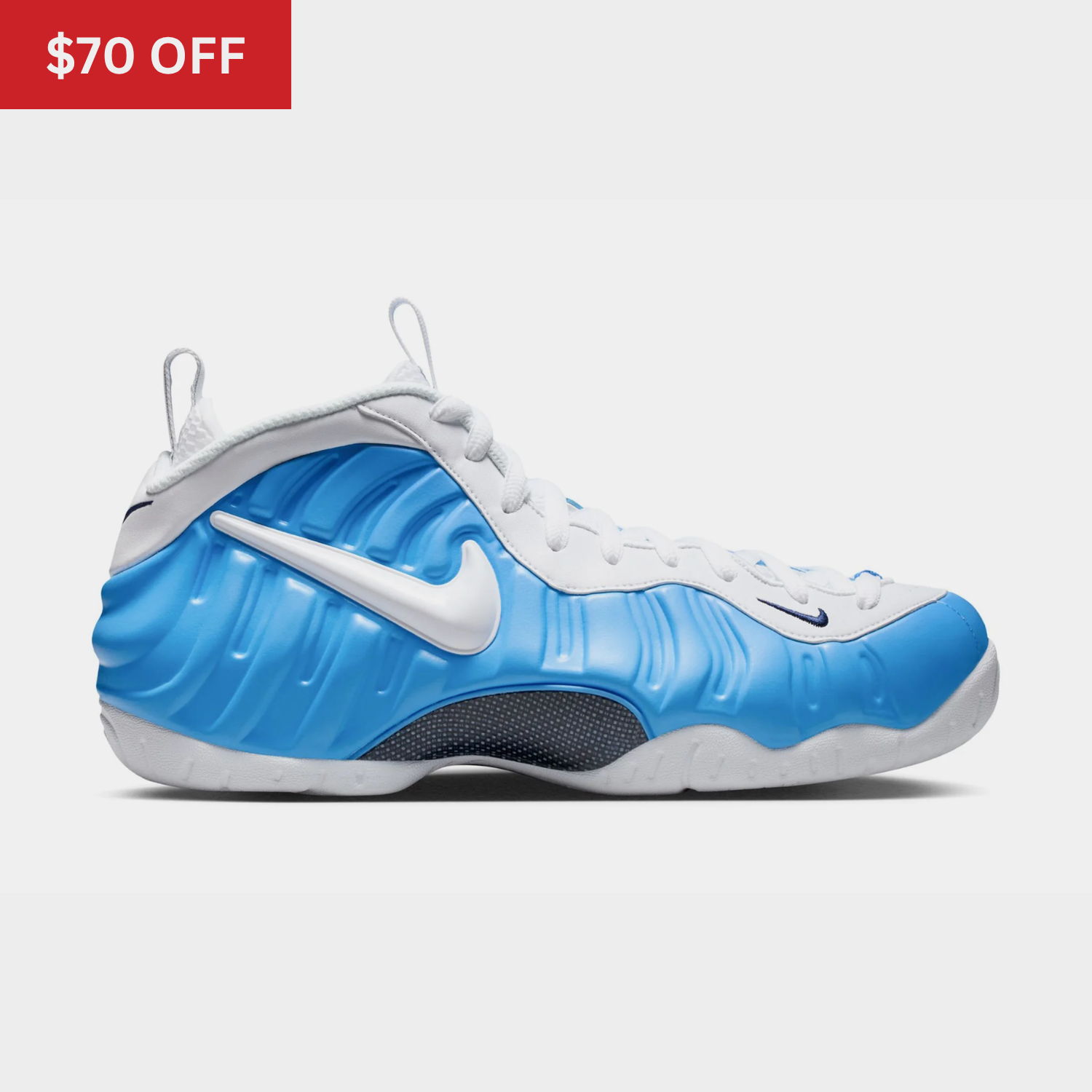 Blue and white Nike sneakers with a discount label.