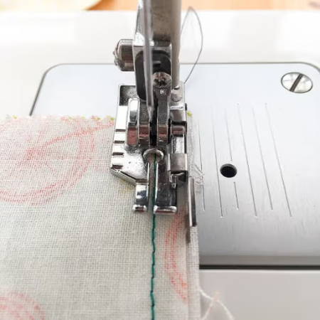 Sewing a seam with a Quilting Foot with guide