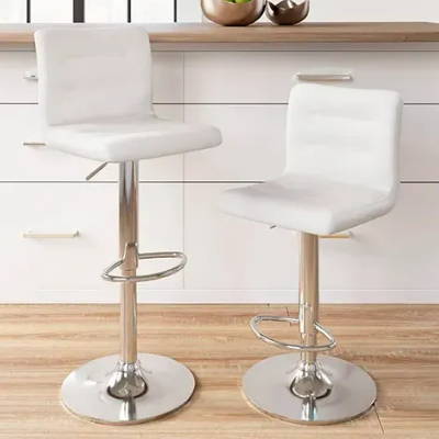A pair of white Barstools