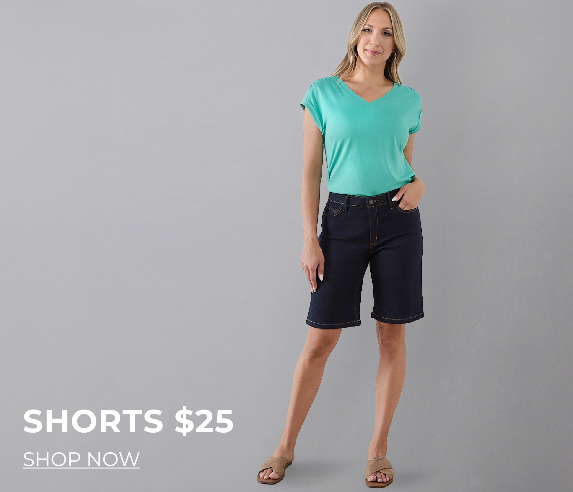 Woman wearing a teal shirt and dark shorts, promoting shorts for $25.