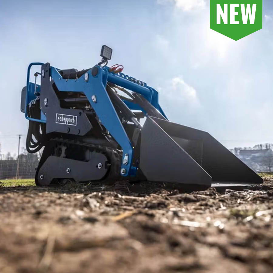 New blue compact excavator on dirt ground with clear sky background.