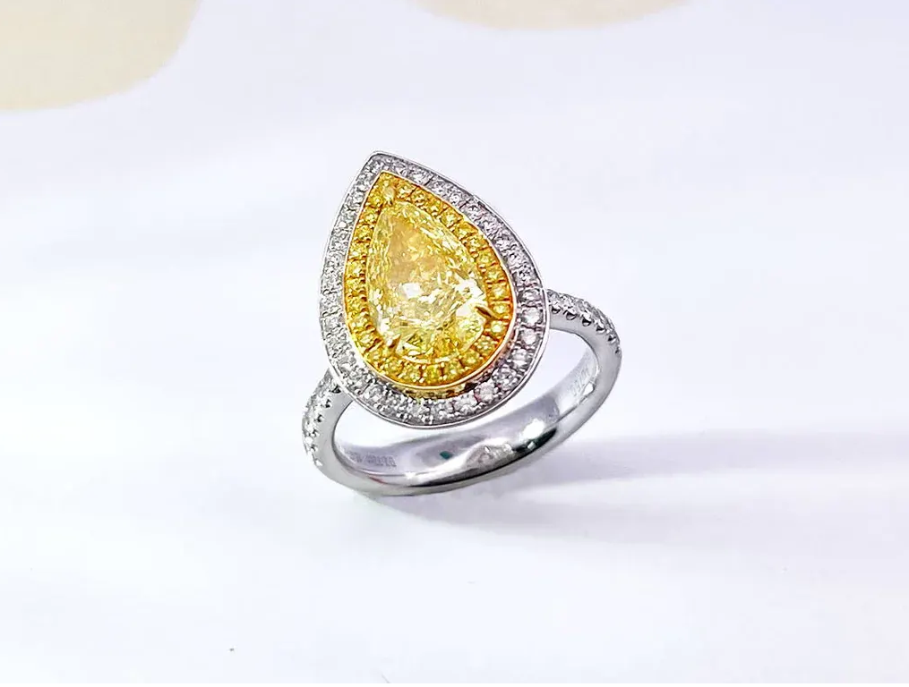Yellow diamond halo ring