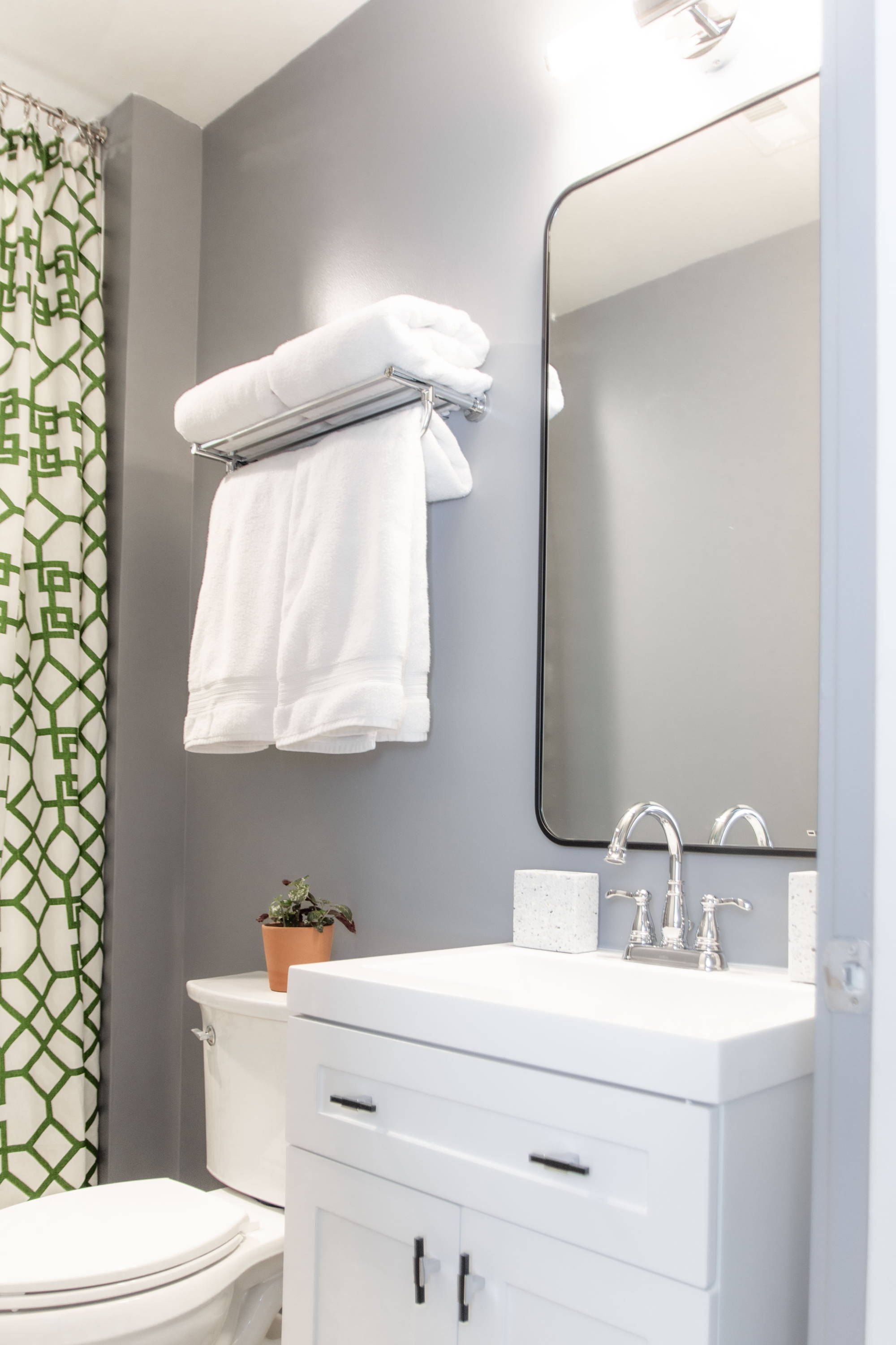 Bathroom renovation reveal, small shower to bathtub conversion, grey bathroom design, slate tile shower, Atlanta interior designer Kevin Francis Design #bathroom #smallbathroom #bathroomdesign #bathroomrenovation