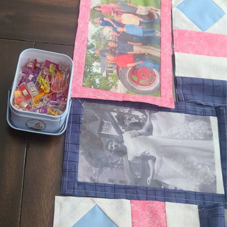 Piecing a quilt with fabric pieces with a photo printed on them