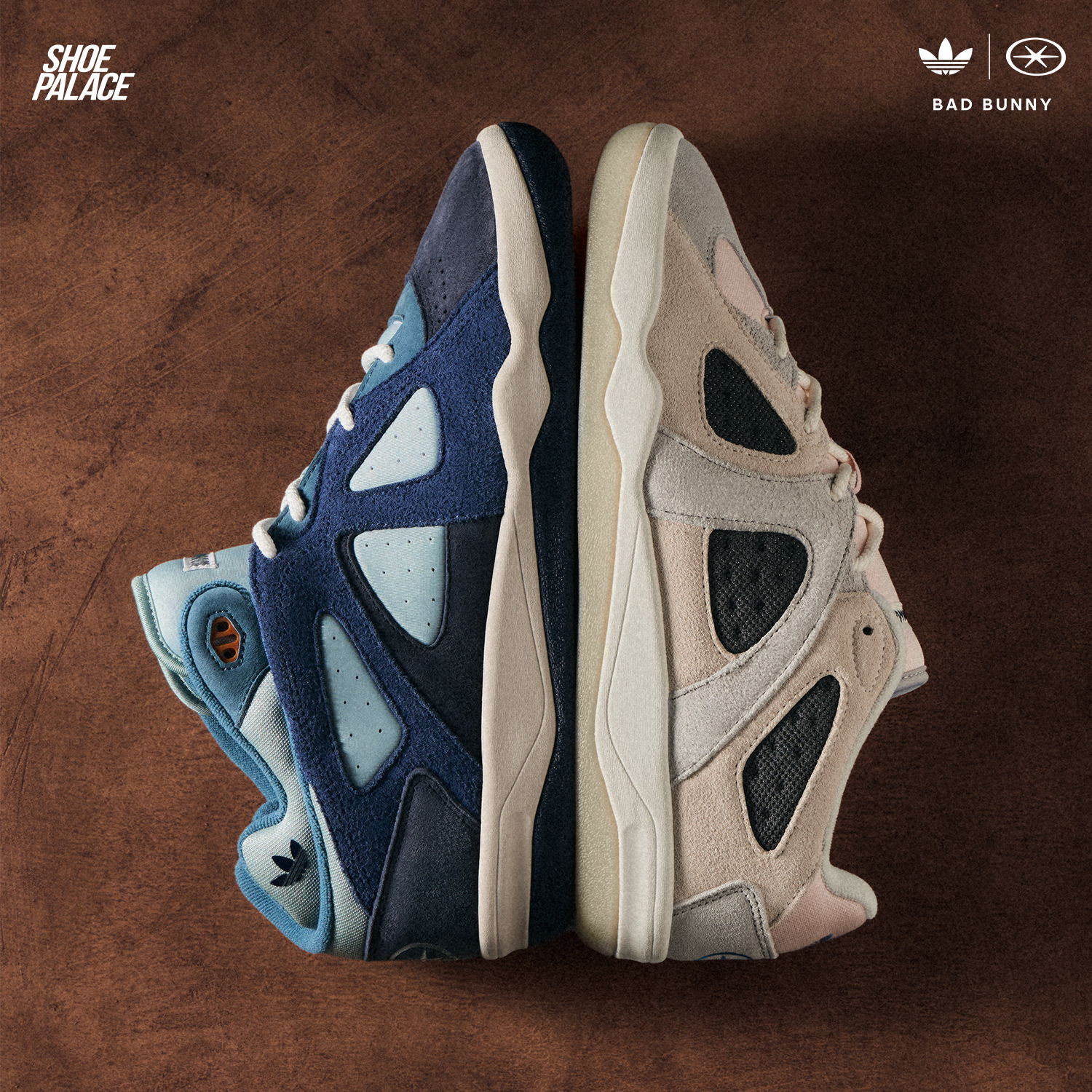Two pairs of sneakers, one navy blue and one beige, on a brown background.