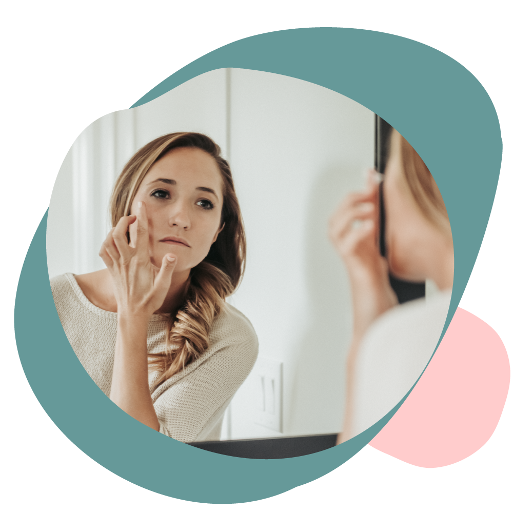 Young woman applying oil-free micro-oxygen moisturizer under eye