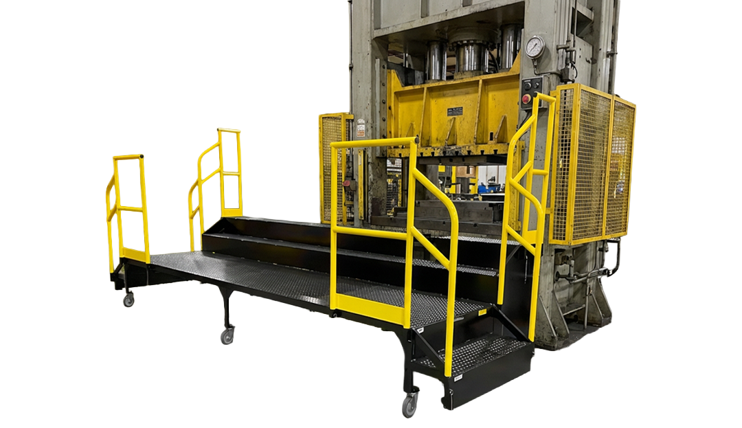 Custom press access platform with pinned guardrails designed for operator reach and visibility around newly installed press equipment