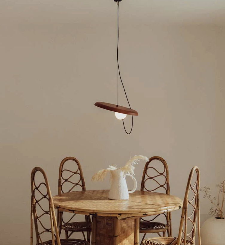 Brass Leaf Wall Light above a rustic table