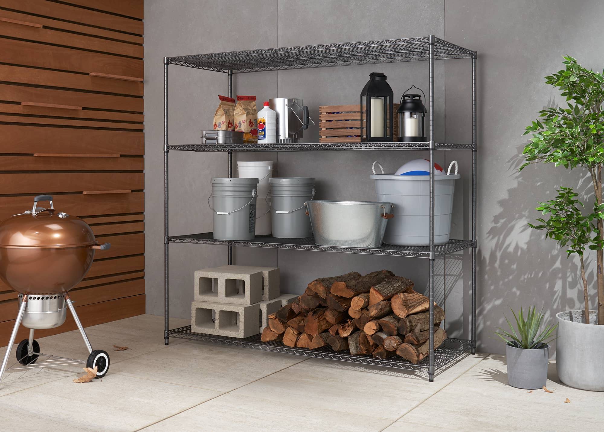wide and deep outdoor wire shelving rack filled with barbeque supplies