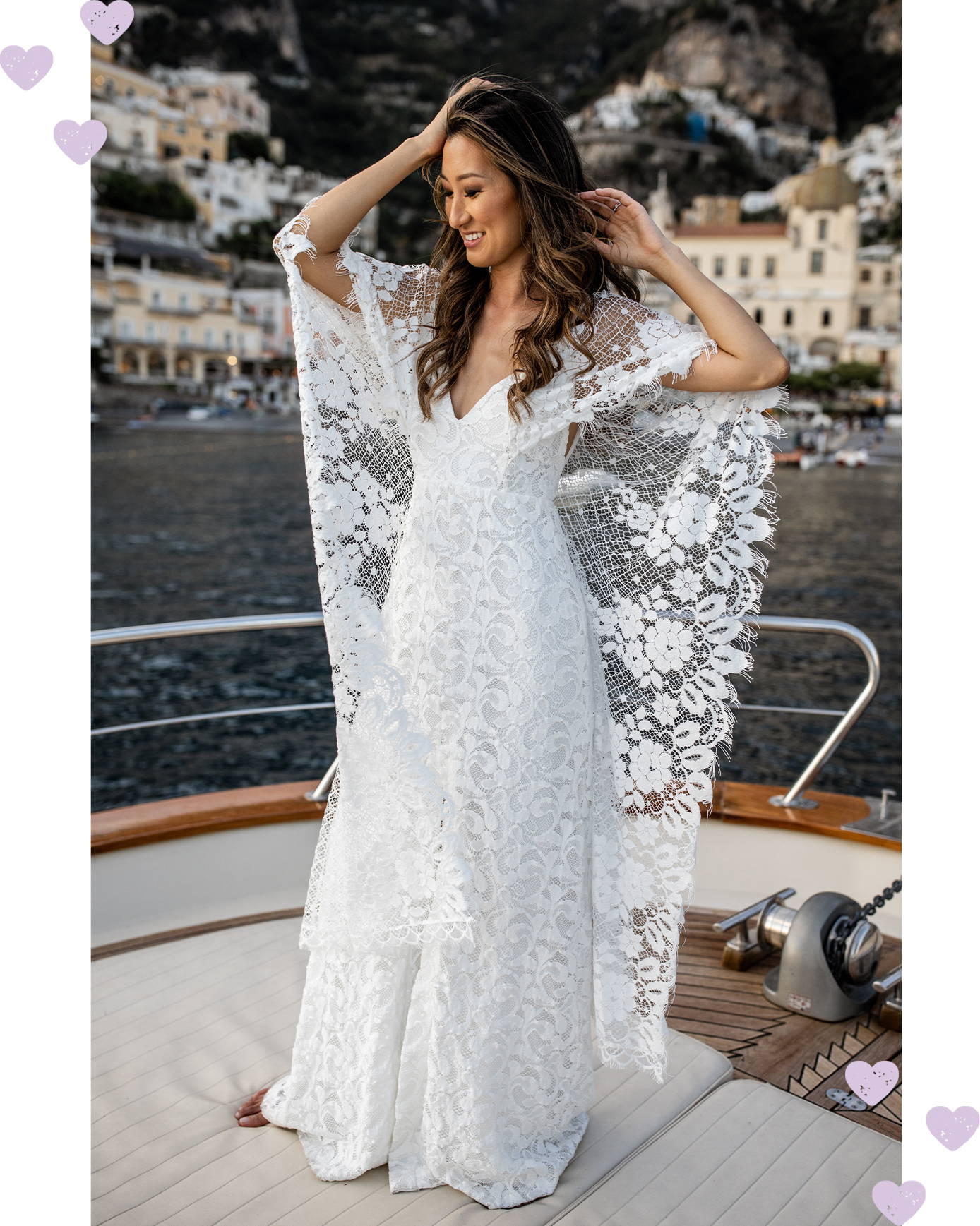 Grace Loves Lace bride wearing the Verdelle 2.0 wedding dress on the front of a yacht in the Amalfi Coast