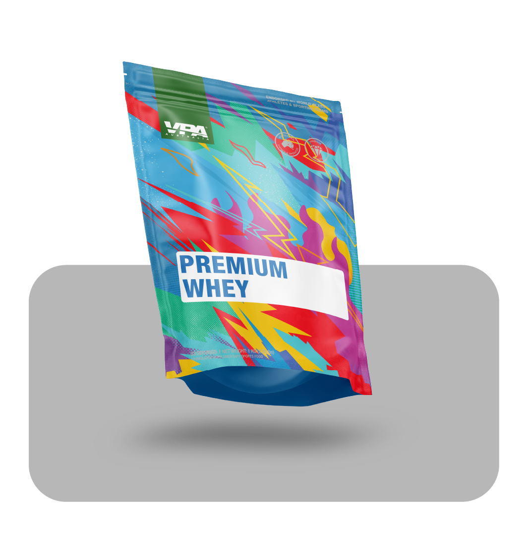 Colorful packaging of premium whey protein on a gray background.