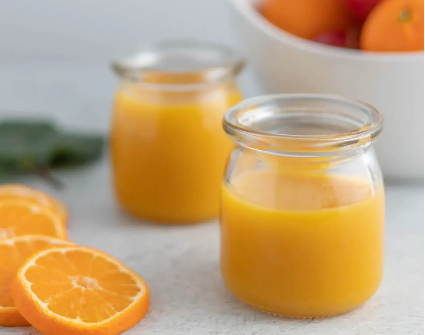 Two orange juice glasses