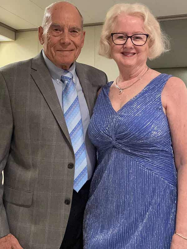 Couple matching in blue formal wear
