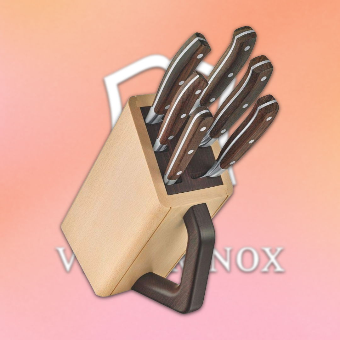 A wooden knife block with several kitchen knives displayed.