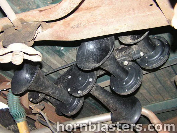 Nathan AirChime K5LA five-bell train horns mounted under Winston's Silverado frame photo 3