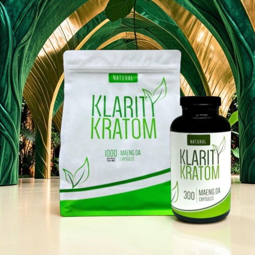 Klarity Kratom packaging with a bag and a bottle on a table.