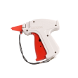 A white and red adhesive glue gun with a trigger mechanism.