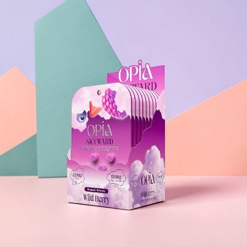 Product packaging for Opia, featuring vibrant colors and playful design elements.