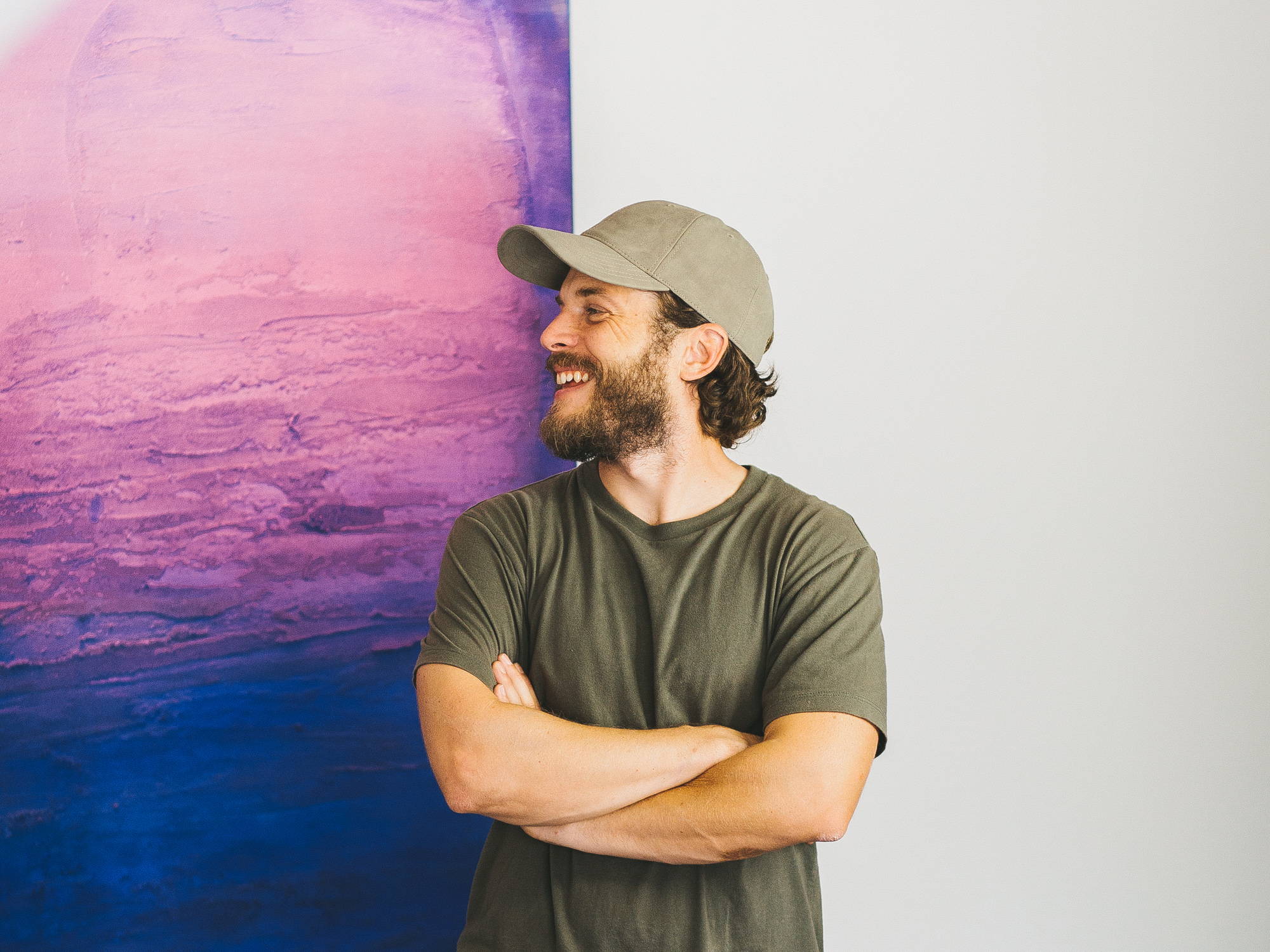 Picture of Jonathan Todryk with painting in the background
