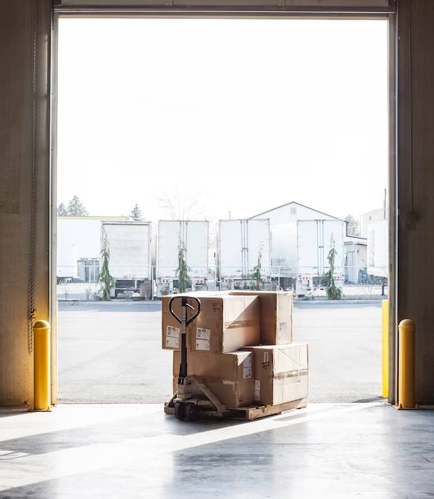 pallet jack at an open dock without a truck present