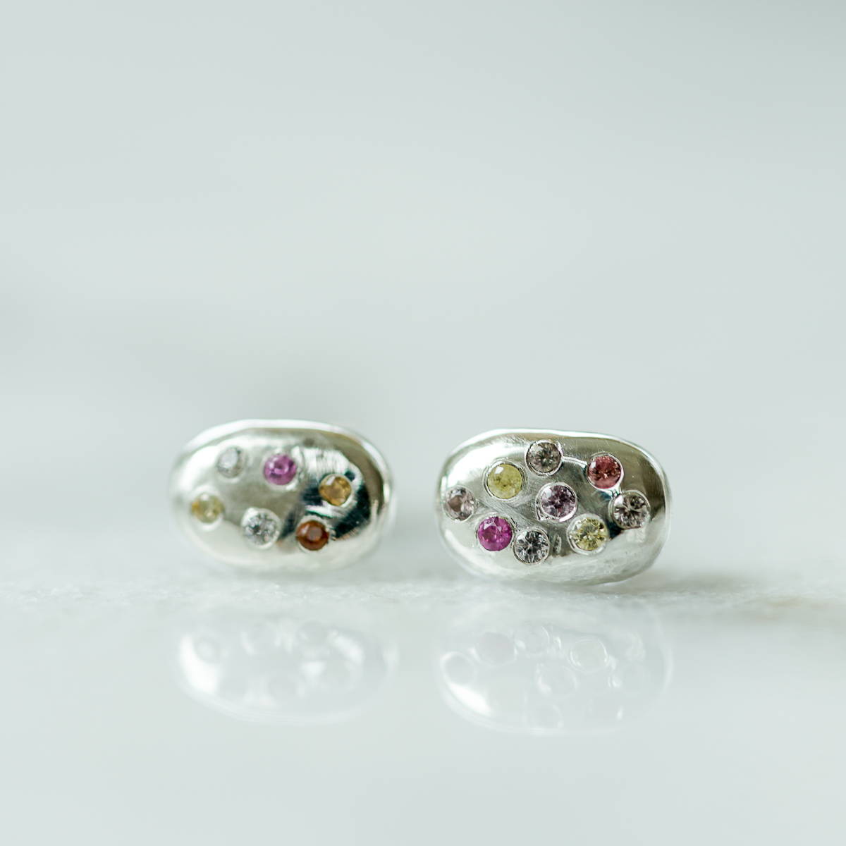 starburst silver earrings rain drop with sapphires