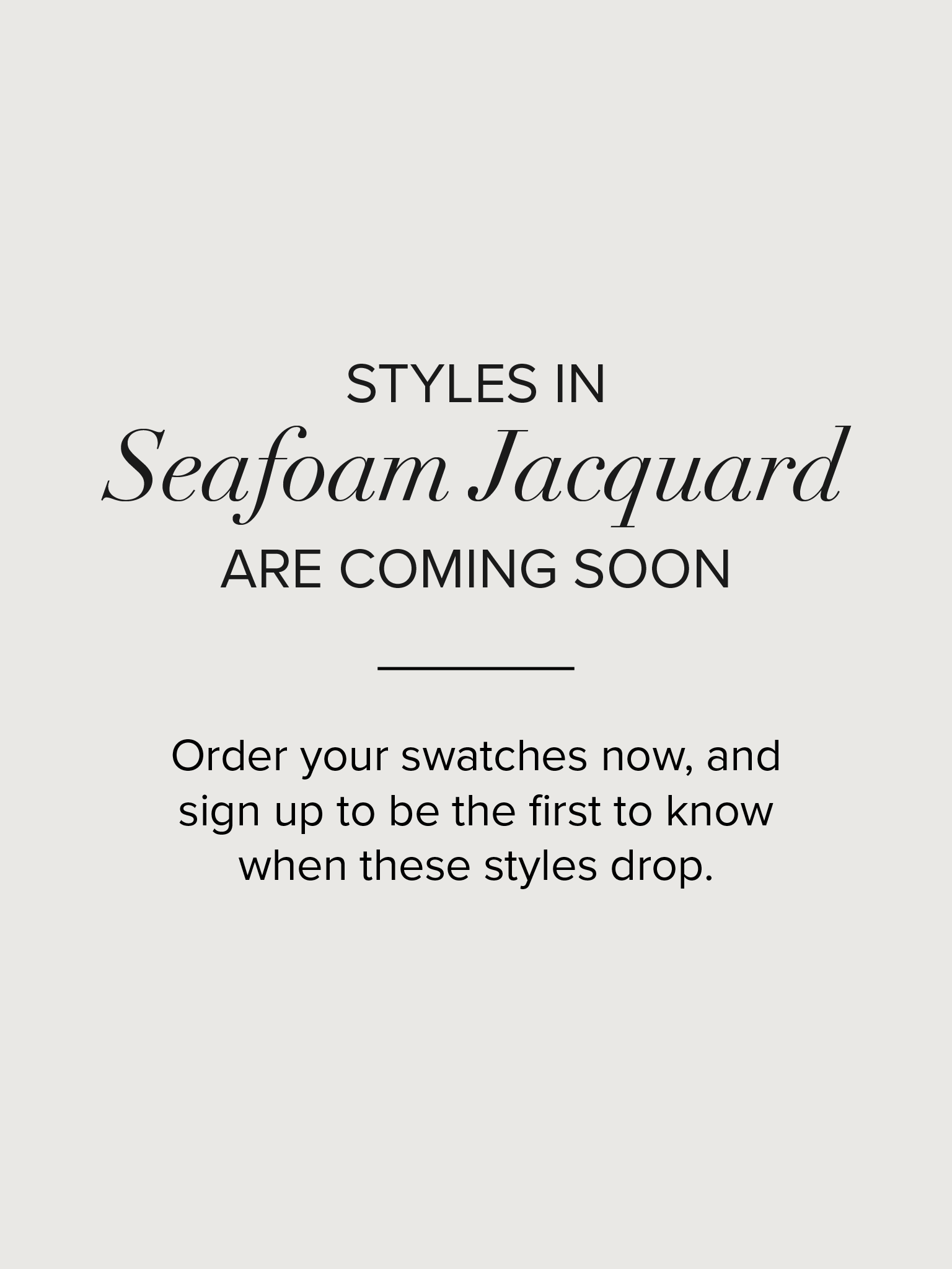 Seafoam jacquard fabric swatch with floral pattern.