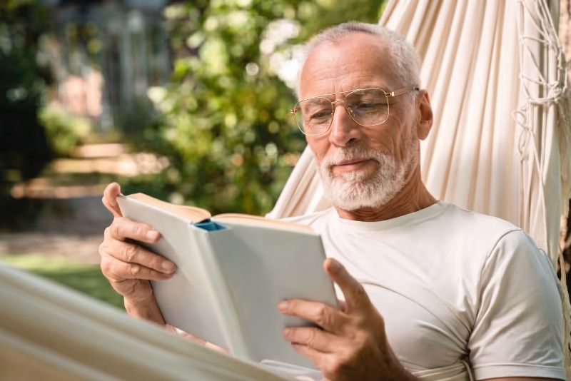 Man wearing Drive Gold progressive lens glasses