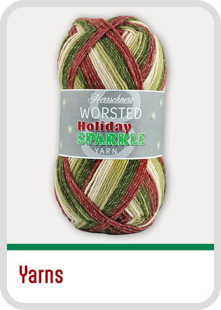 Skein of holiday-themed worsted yarn in red, green, and white colors. Christmas Yarns