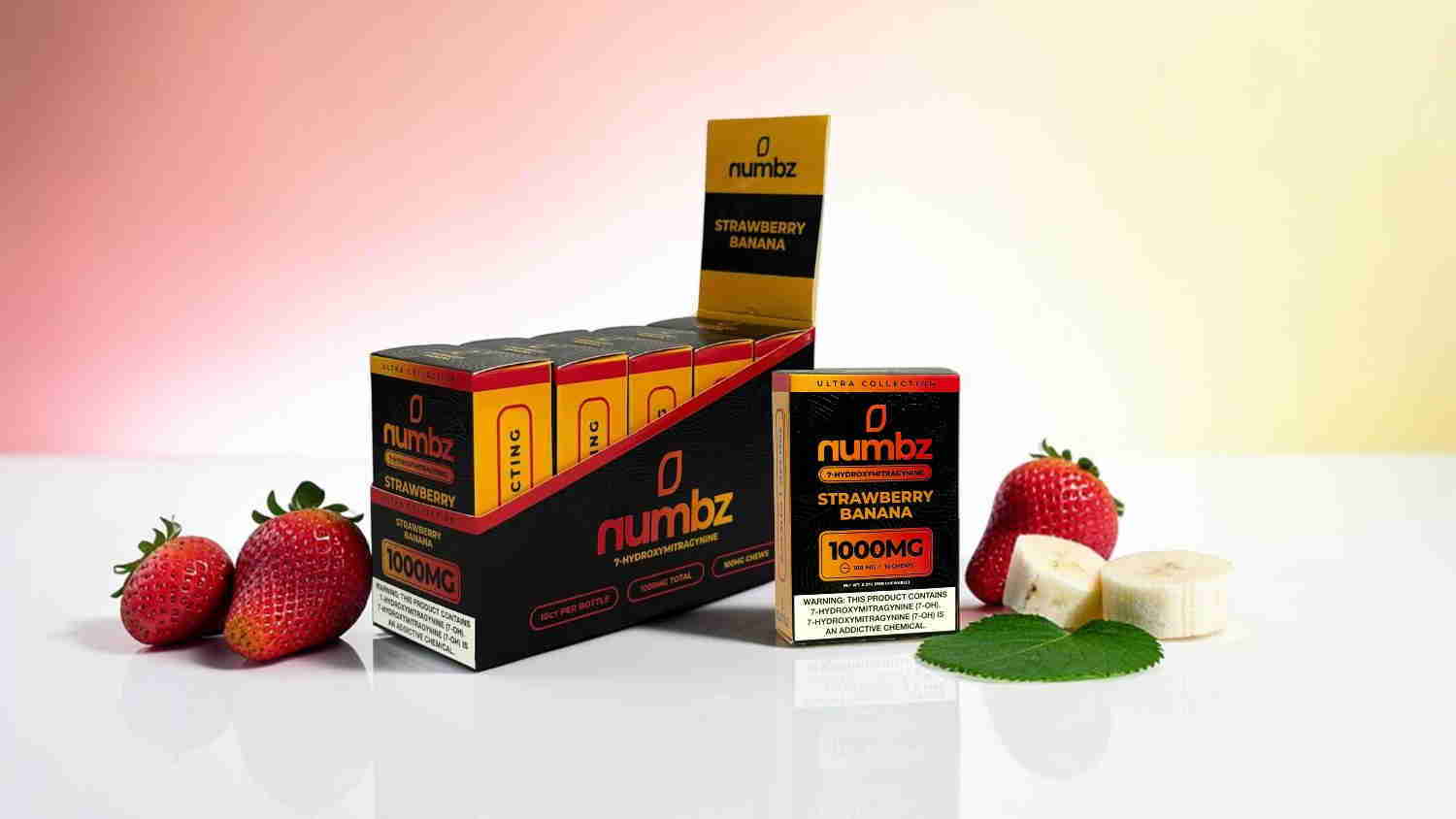 Box of Neuro products with strawberries and banana on a reflective surface.