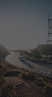 Car driving along a winding road 