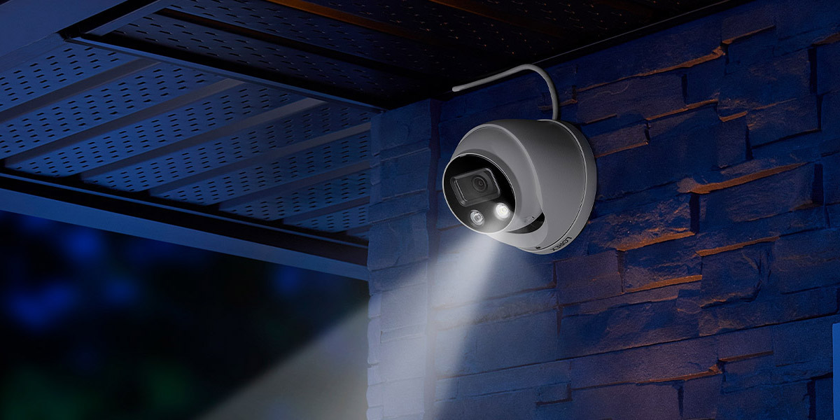 dome security camera on wall at night