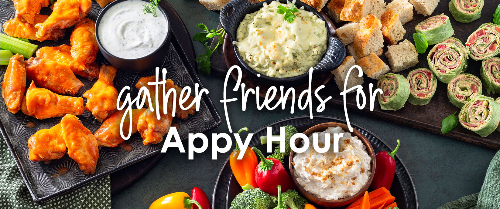 Gather friends for Appy Hour. Image featuring buffalo wings, pinwheel sandwiches, vegetables, bread cubes, and creamy dips. View Appy Hour product page