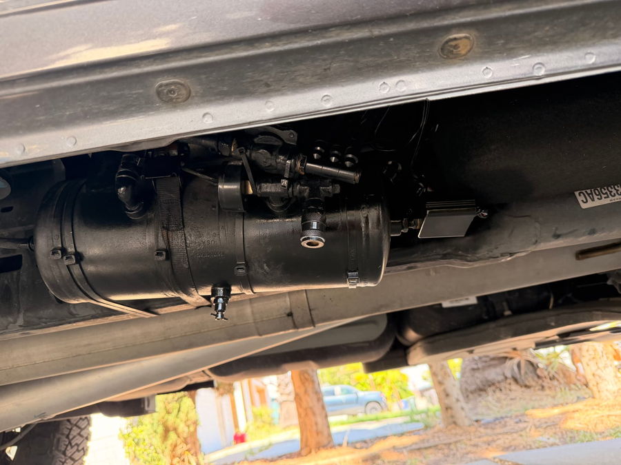 Side profile or rear-quarter Brian's 2020 RAM 2500 HornBlasters Conductor's Special train horn kit customer install gallery photo 3