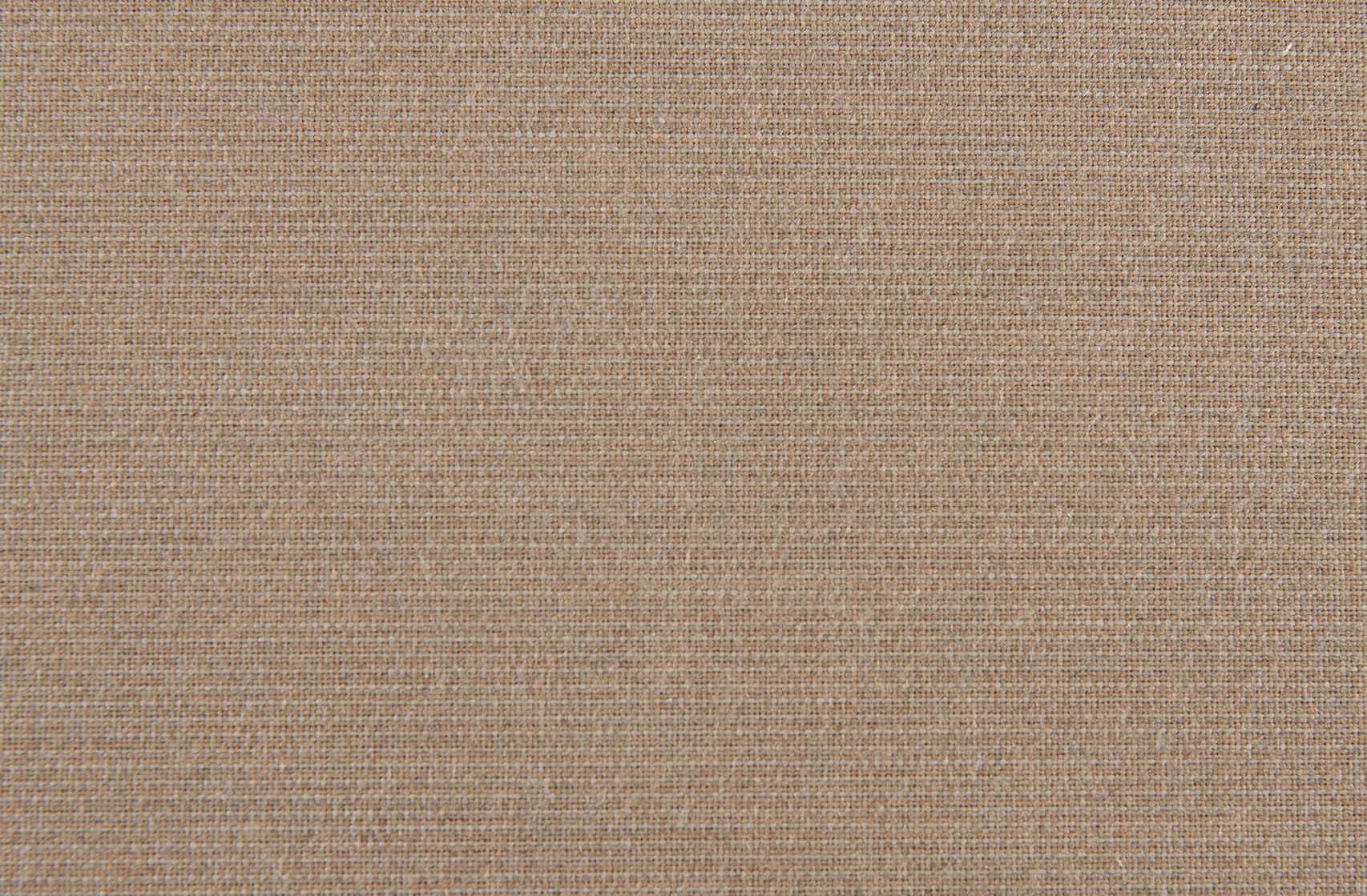 A textured beige surface with subtle lines.