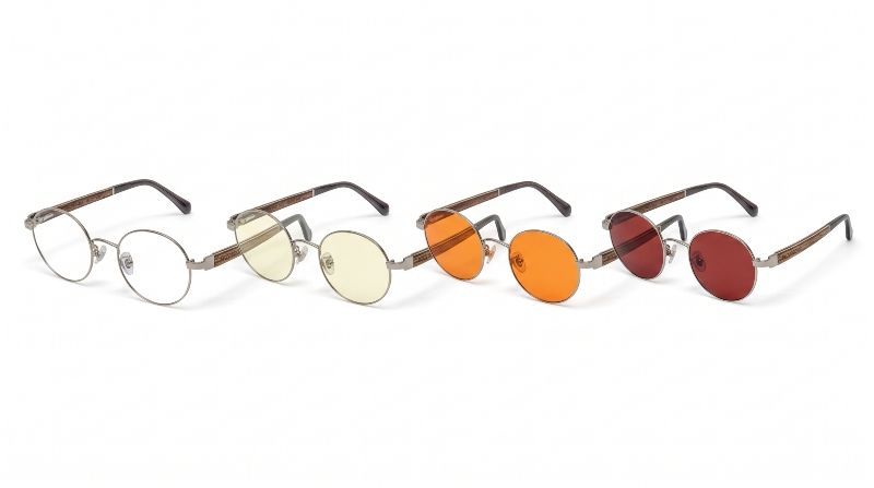 4 different pairs of blue light blocking glasses with clear lenses, yellow lenses, orange lenses and red lenses